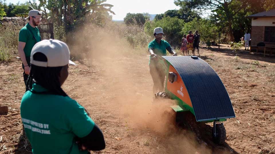 People watching someone use the tractor