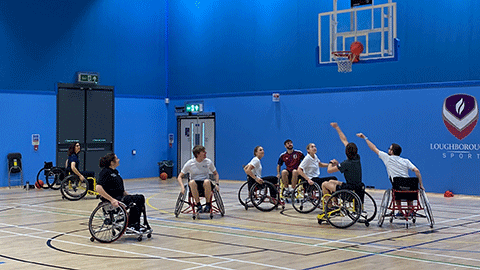Group playing 4 vs 4 wheelchair basketball