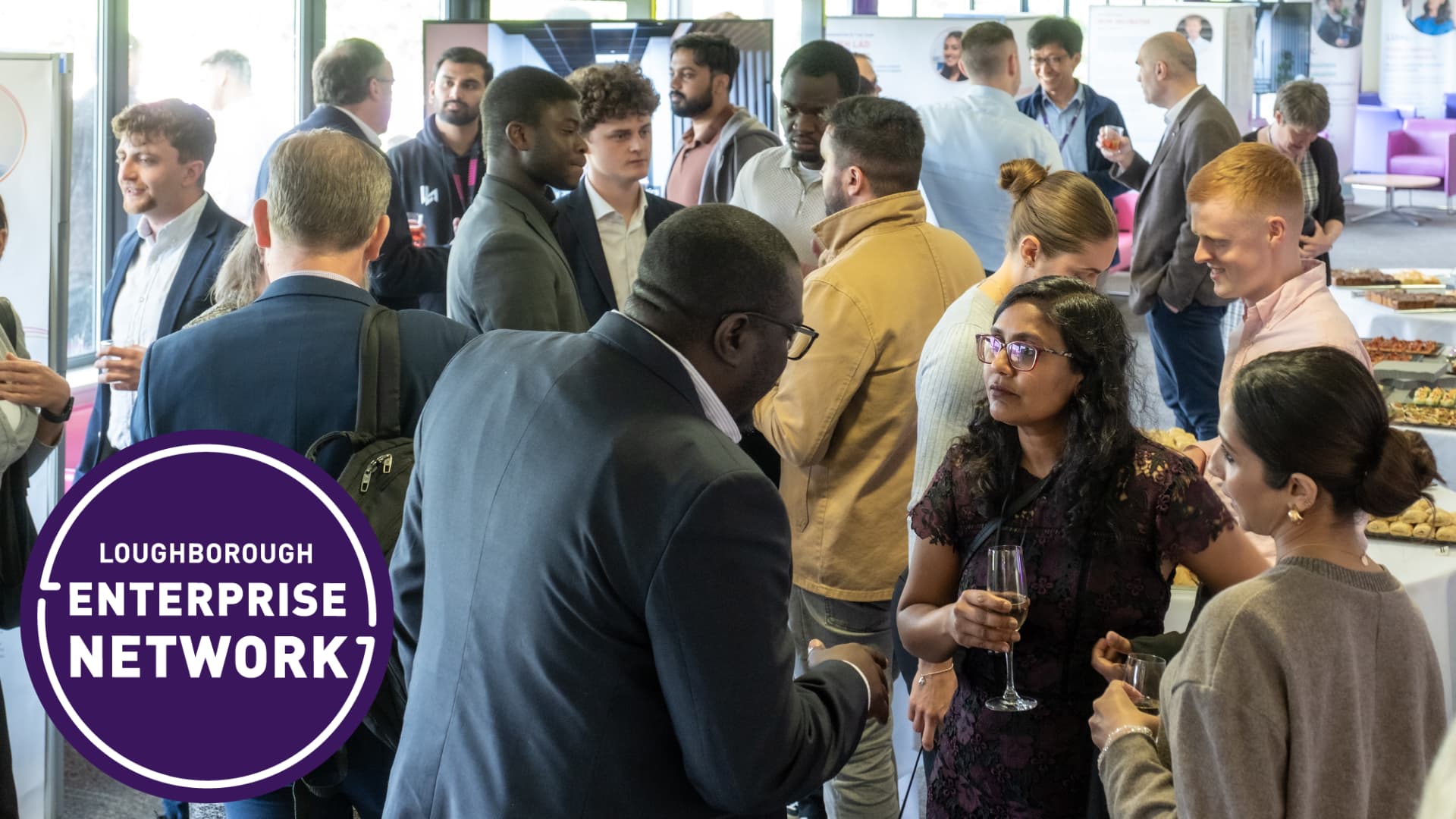 Loughborough Enterprise Network. A buffet in an exhibition space with many people networking