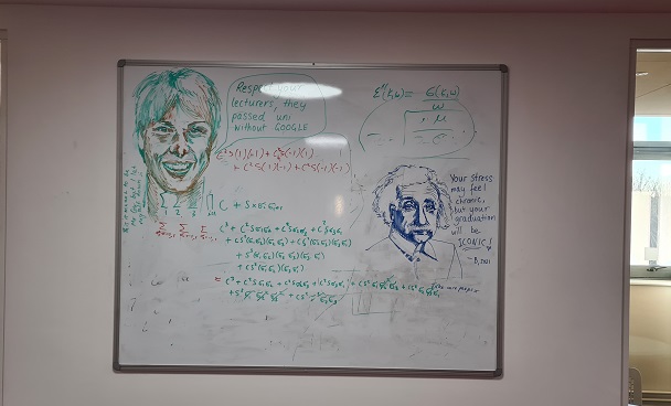 a white board with drawings and text