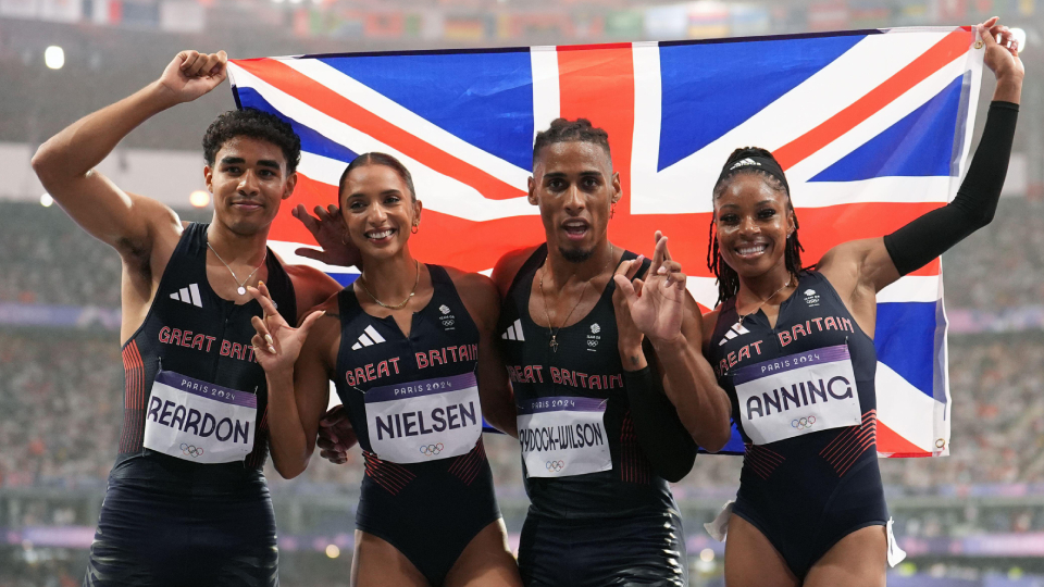 Great Britain's Samuel Reardon, Laviai Nielsen, Alex Haydock-Wilson and Amber Anning celebrate after winning a bronze medal