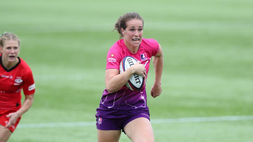 emily runs with the ball