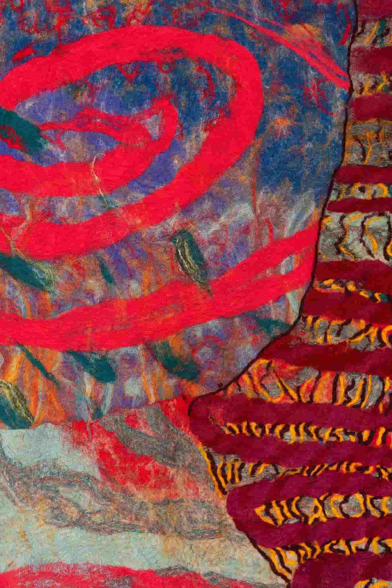 Close-up of a colourful tapestry made of felt.