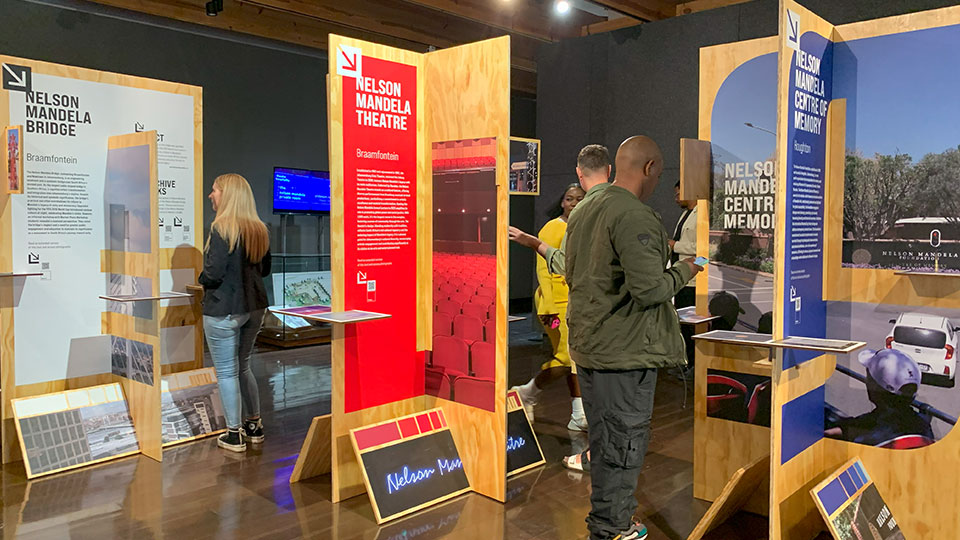 Visitors exploring the Named after Nelson exhibition