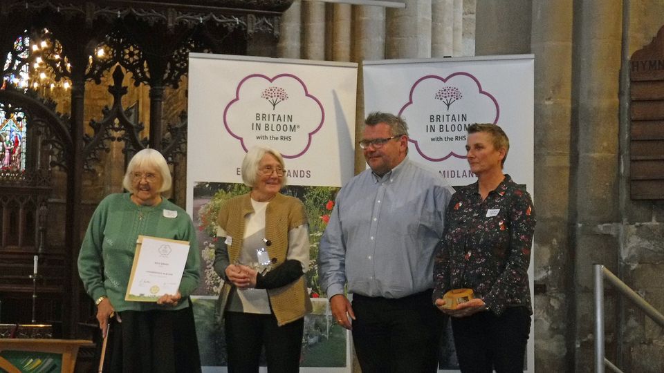 Loughborough in Bloom board members June Bush, Pat Cook and Kaz Setchell receiving the award.